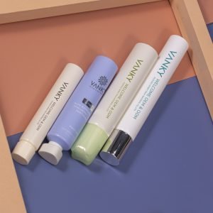 Customized plastic soft tube packaging with distinctive caps